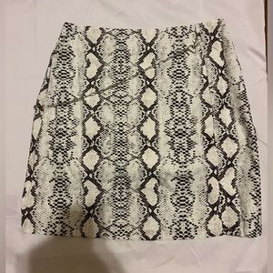 Women’s snake print skirt